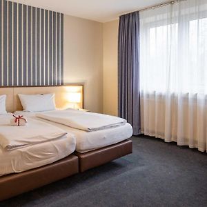 Kamer met een Queen Size Bed